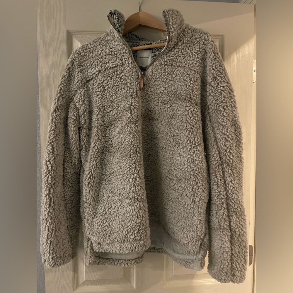 Super comfy, like new jacket.  Pullover style.  No pockets.